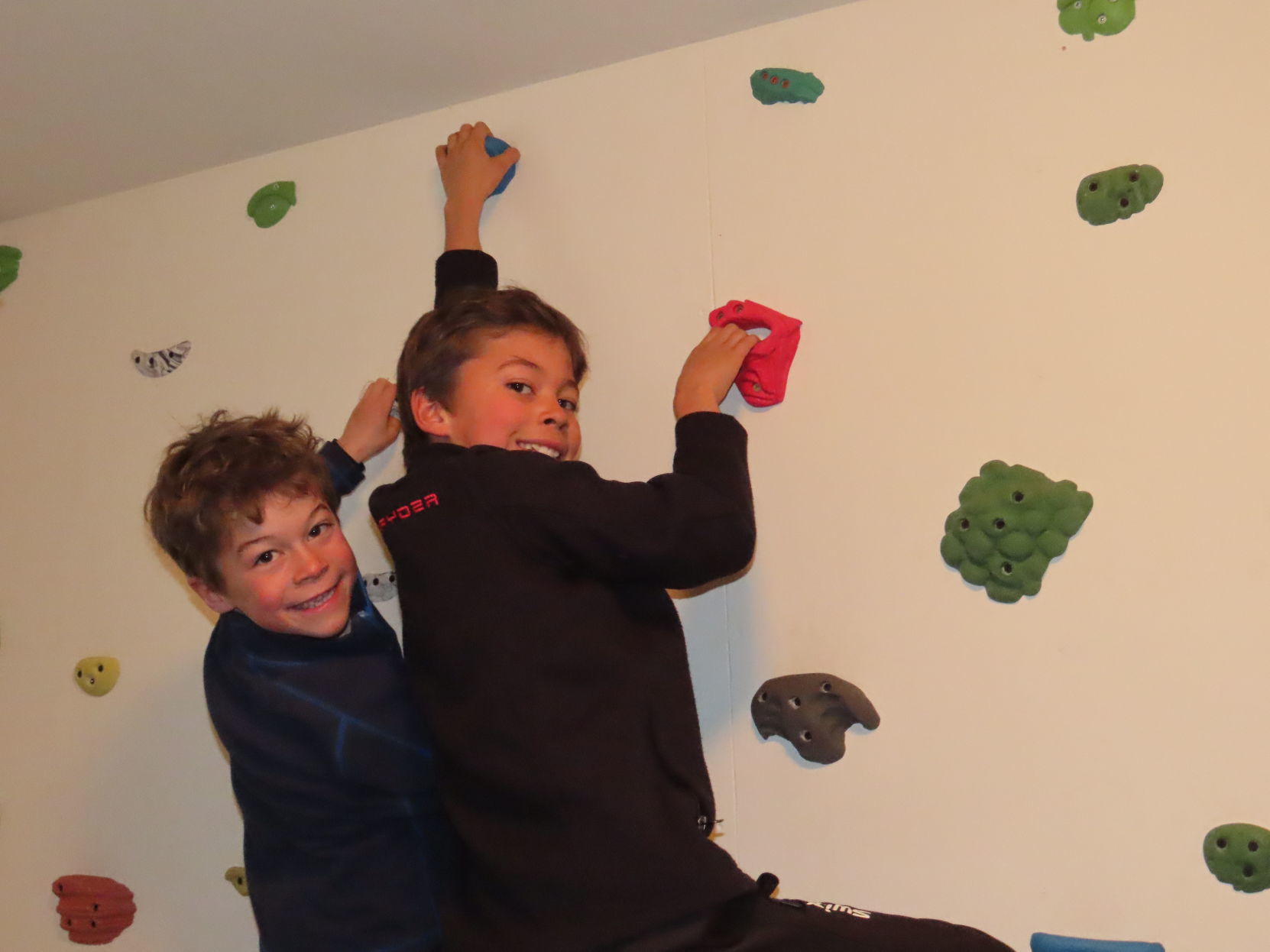 Climbers on climbing wall